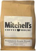 Brown paper bag with 'Mitchell's Coffee House' label on a white background